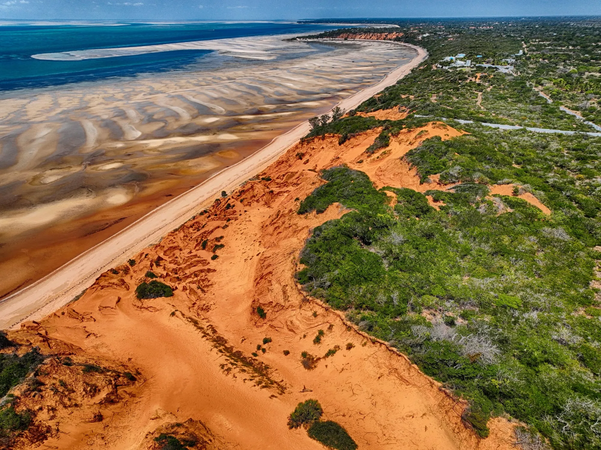 Red dunes meeting the Indian Ocean near Vilankulo