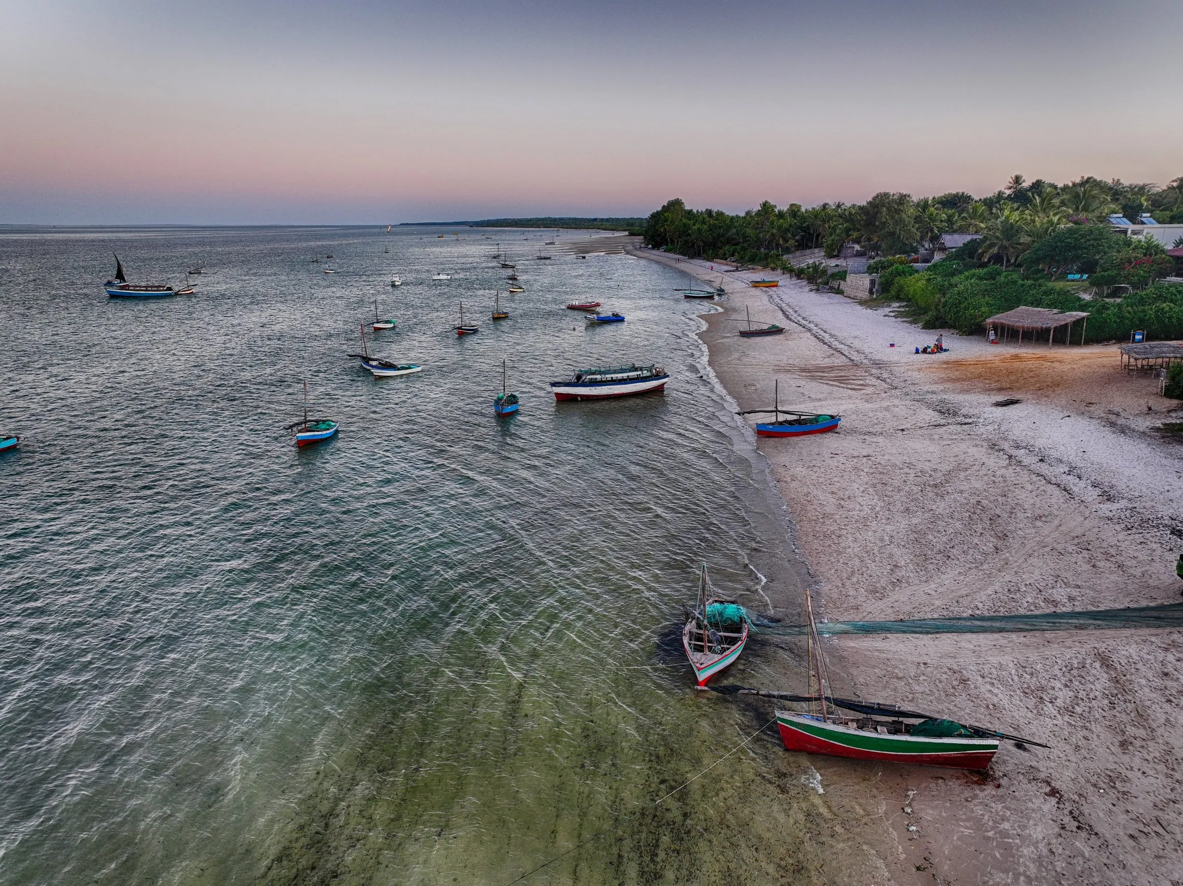 Fishing boats along the Vilankulo shore at dusk, from the air