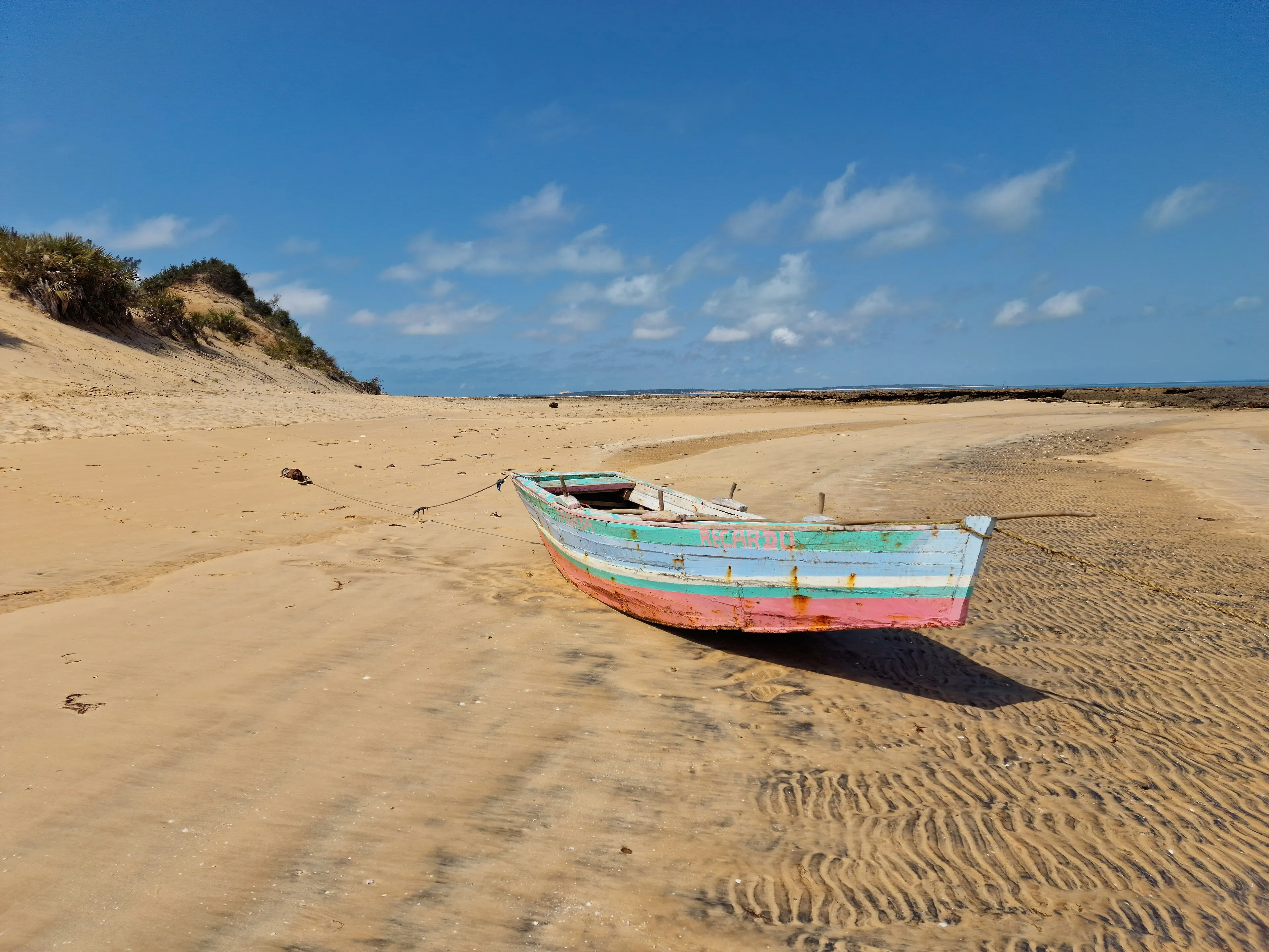 A traditional fishing boat on the shore of Bazaruto Island